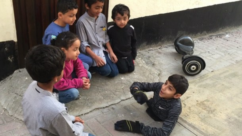 Ghanim al Muftah with other children